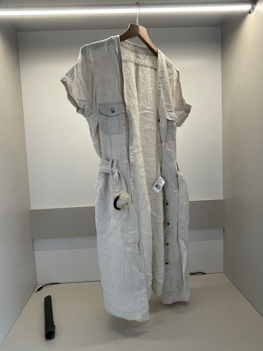 Sukienka z lnu, tatuum