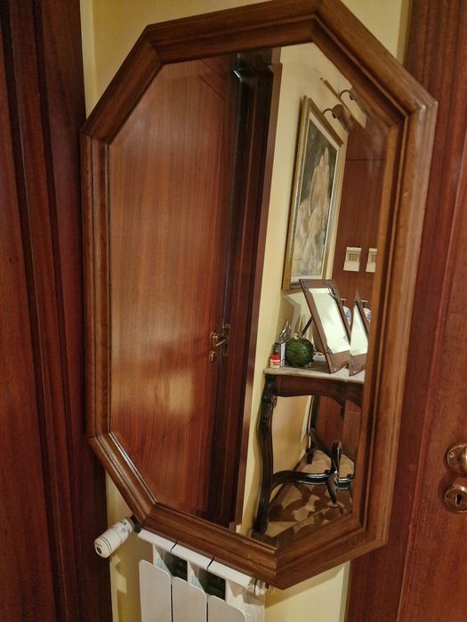 Espelho antigo bom estado.