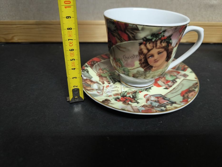 Chávena de chá em porcelana com motivos natalícios
Conjunto de chávena