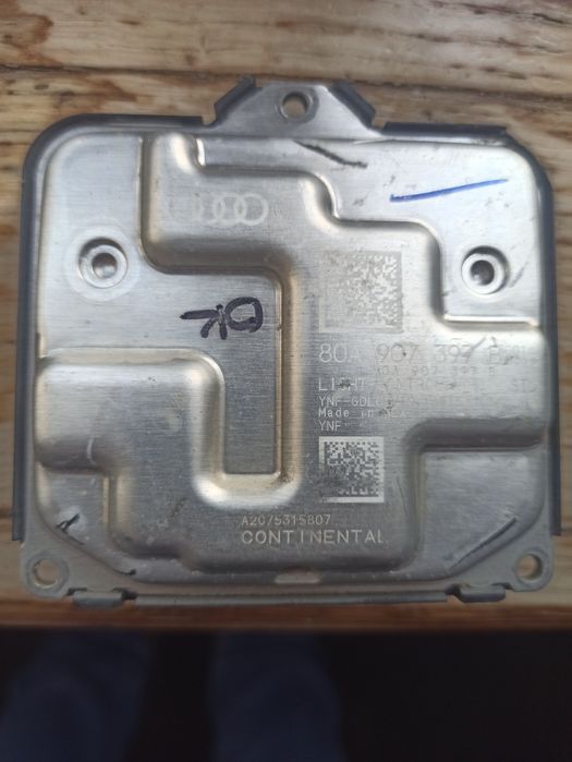 Блок керування фари Audi 80А оригінал б/у