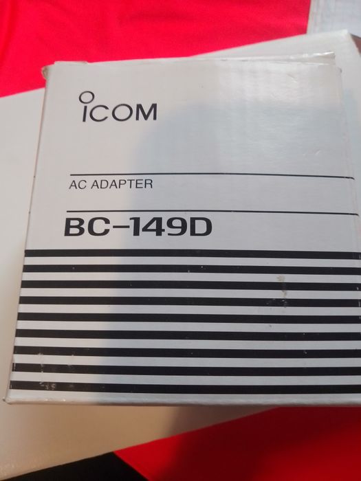 Оригинальный блок питания Icom BC - 149D(6V, 1000mA) новый . Цена 350гр.