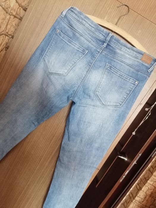 Spodnie jeansy Tally Weijl z dziurami