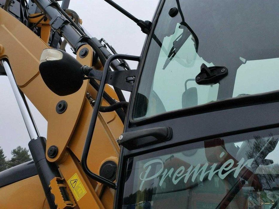 Екскаватор-навантажувач Caterpillar 444E