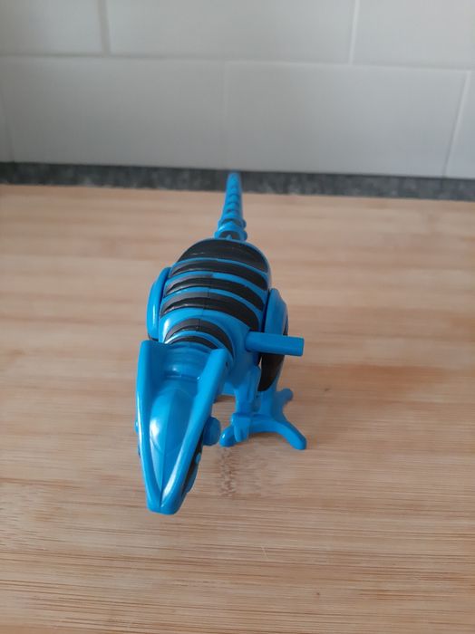 Dinossauro azul e preto
