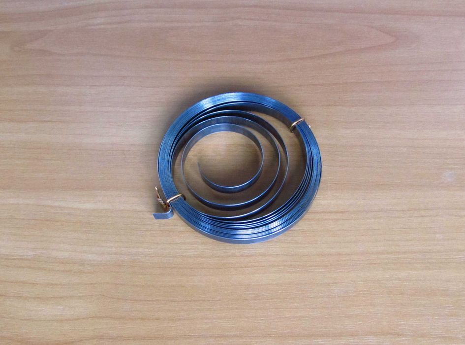 Пружина сматывающего механизма пылесоса