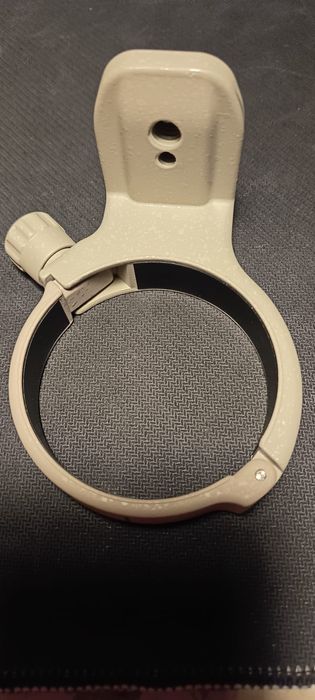 Vendo braçadeira de suporte com placa de liberação rápida. NOVA.