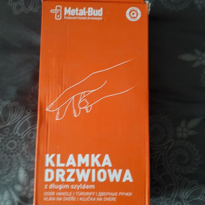 Klamka do drzwi z dlugim szyldem