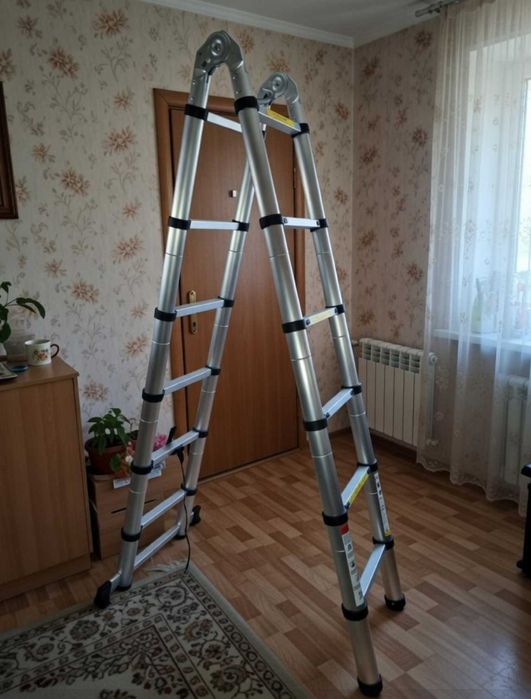 Телескопічна драбина 2,1 м компактна й зручна