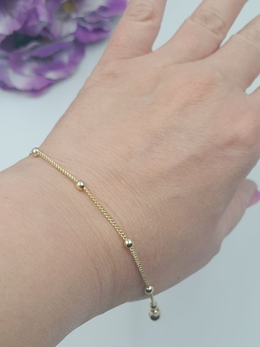 Bransoletka pozłacana 14 k z kuleczkami