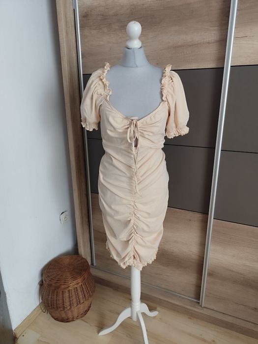 Beżowa dziewczęca sukienka r.48/50