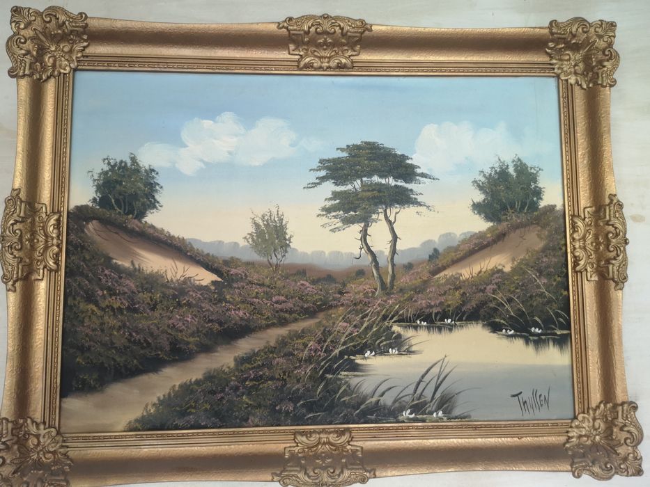 Obraz w zlotej ramie