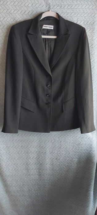 Jak nowa elegancka marynarka taliowana