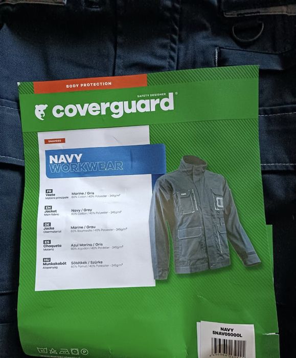 Робочий комбінезон (куртка+штани), темно синього кольору.