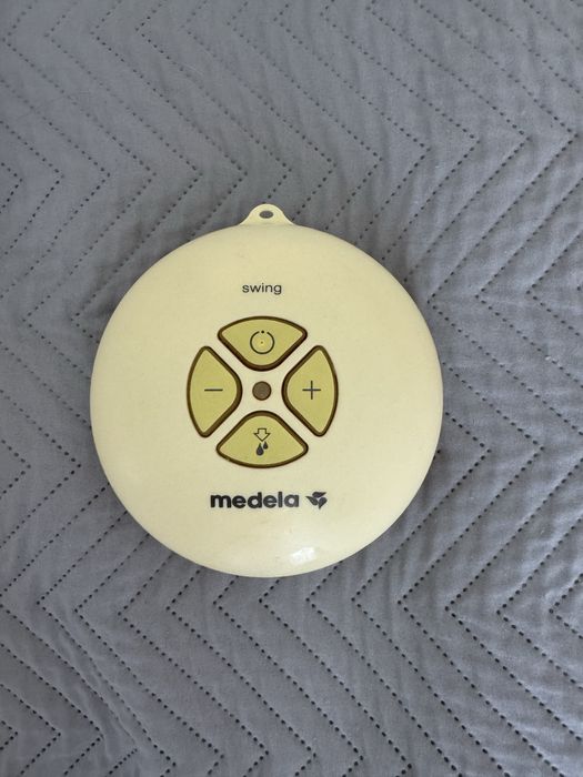 Medela swing електричний молоковідсмоктувач + клапани