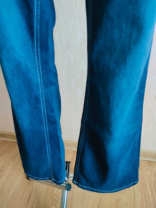 NOWE niebieskie spodnie jeans dzwony 7/8 wysoki stan r. 40 L John Baner