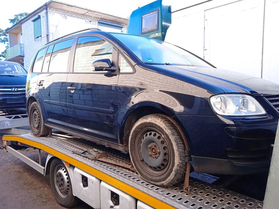 Na części VW Touran 1.4 TSI lakier LC9X silnik BMY skrzynia biegów HYG maska klapa drzwi zderzak lampa błotnik fotel kanapa szyba