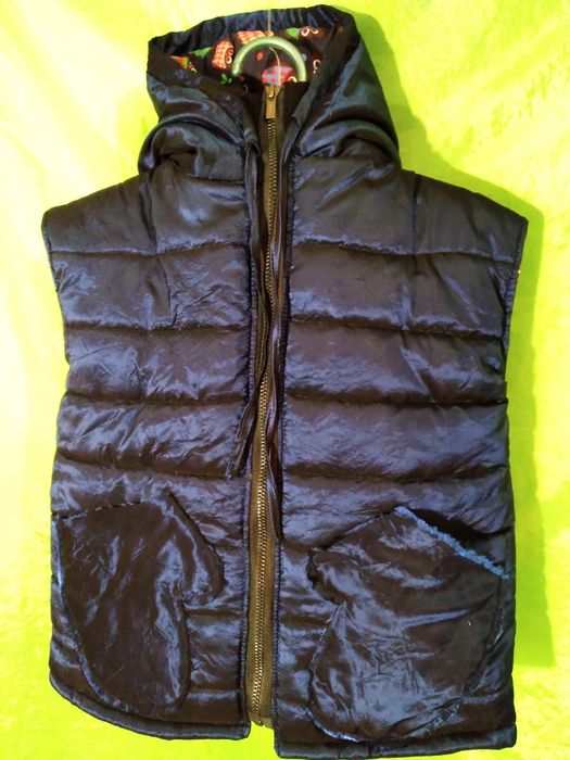 Нова дитяча безрукавка