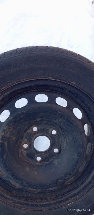 Автомабильная шина і диск б/у 205/60R16  на запаску