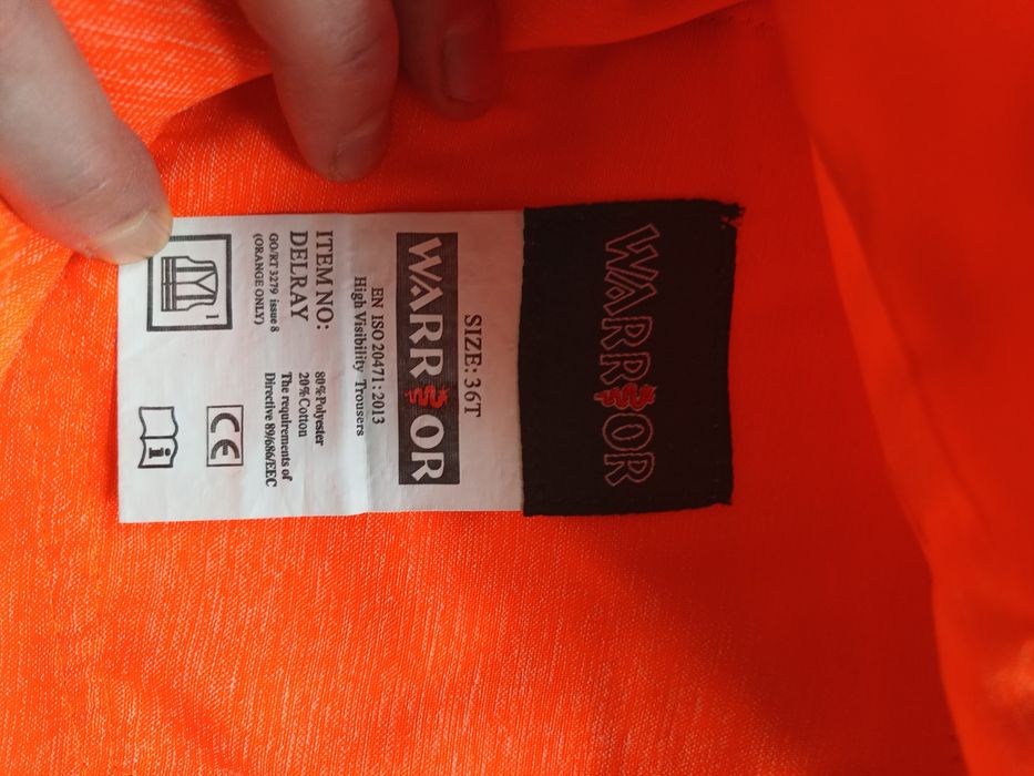 Męskie spodnie robocze pomarańczowe odblaskowe jak nowe Warrior