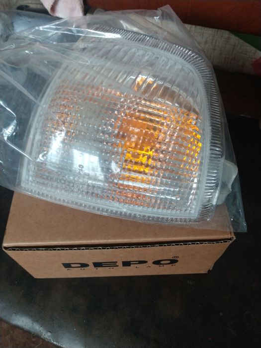 Указатель поворота Мазда 323, форд эскорд