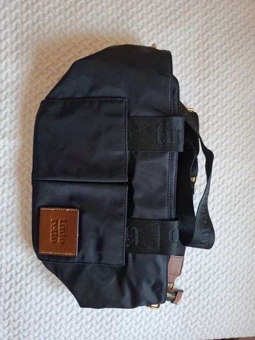 Mala preta e castanha da Tintoretto