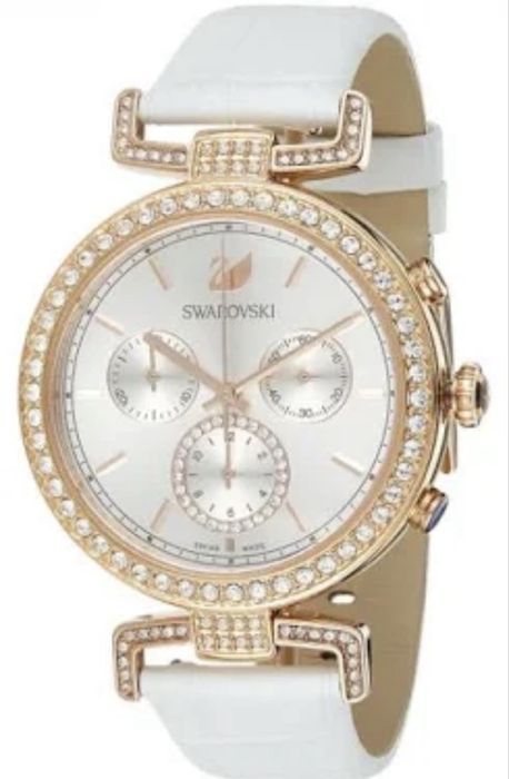 Оригинальные часы Swarovski  с кристалами в золоте ,новые. В полной ко