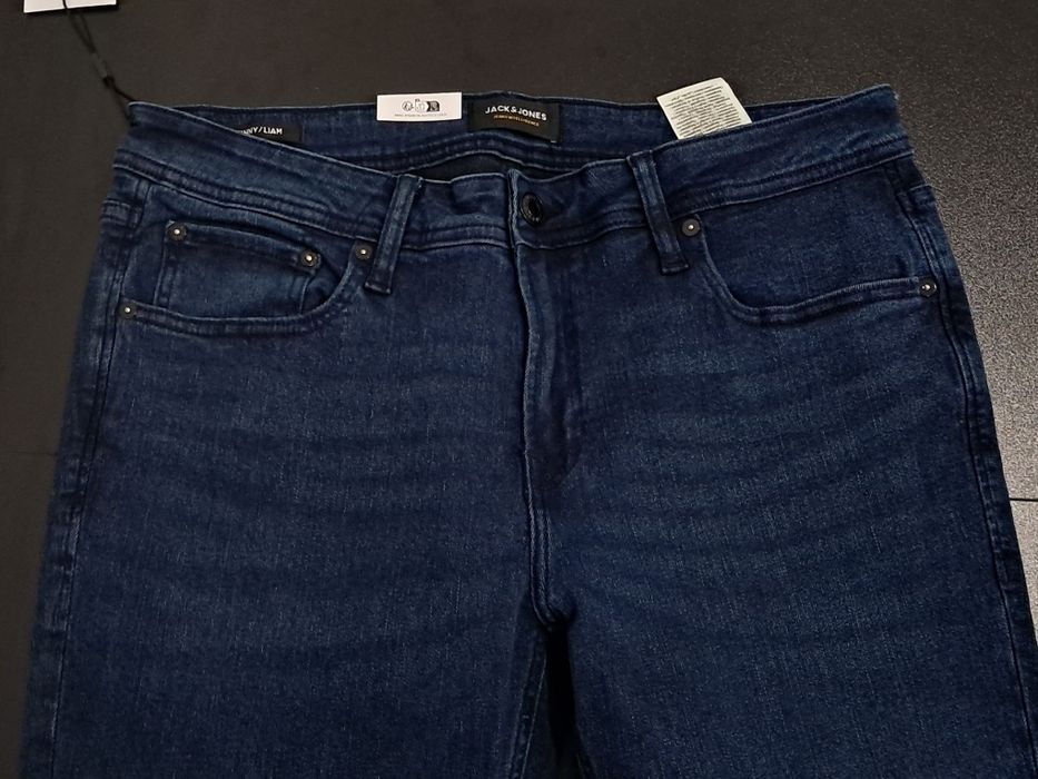 calças de ganga de homem