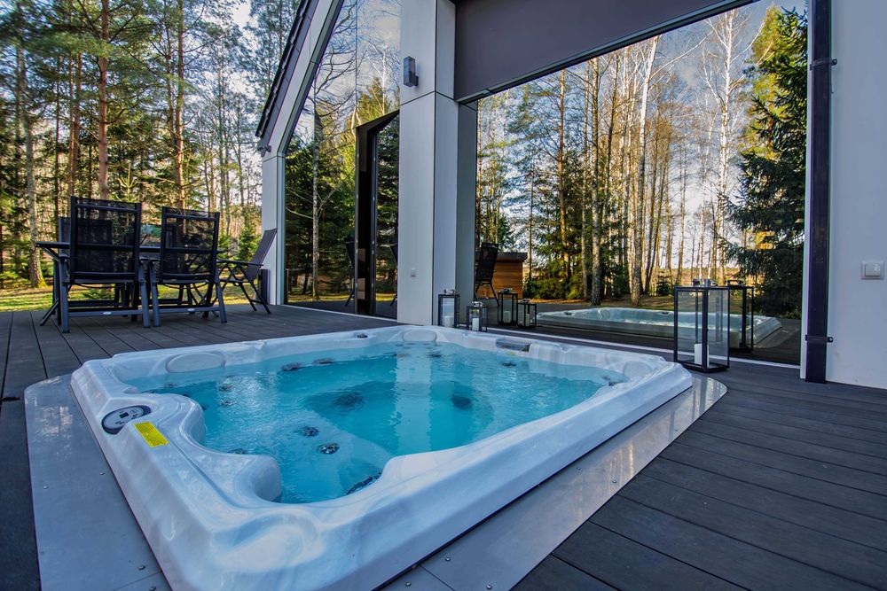 Dom do wynajęcia z jacuzzi, prywatną plażą i pomostem