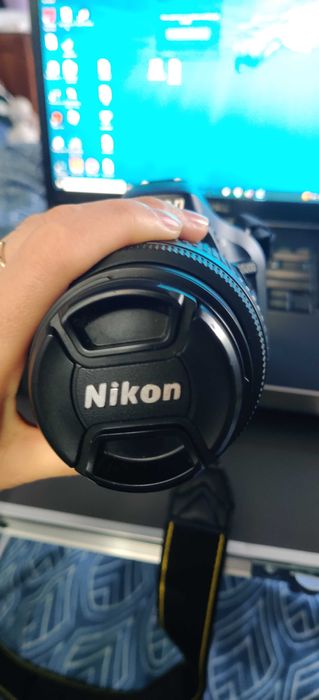Nikon 5200, Lente, 2 baterias e uma mochila e mais coisas