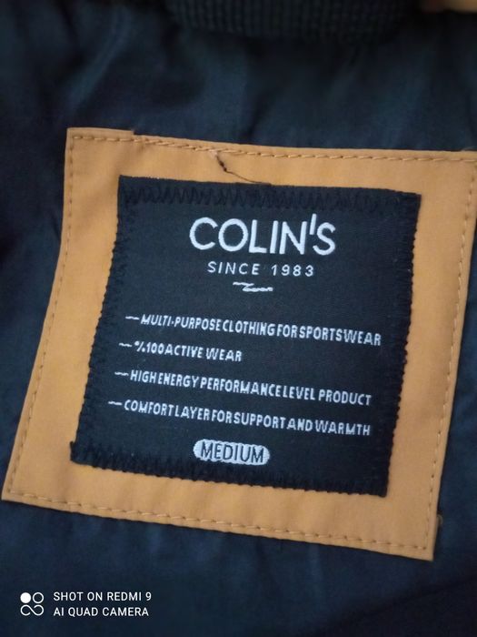 Продам пуховик Colins
