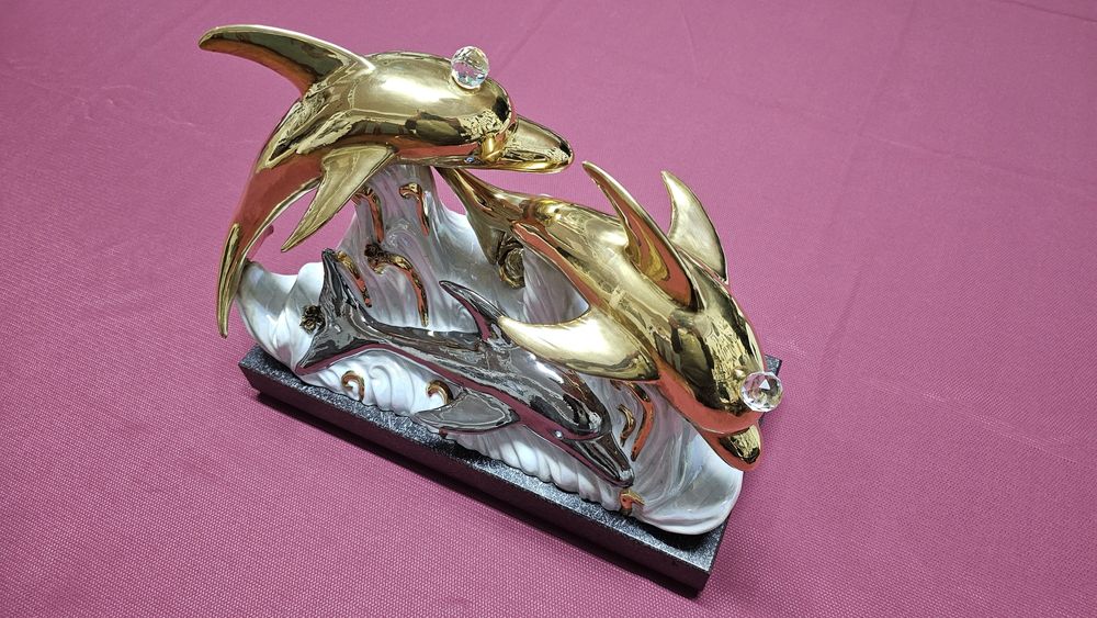 Estatueta golfinhos em porcelana