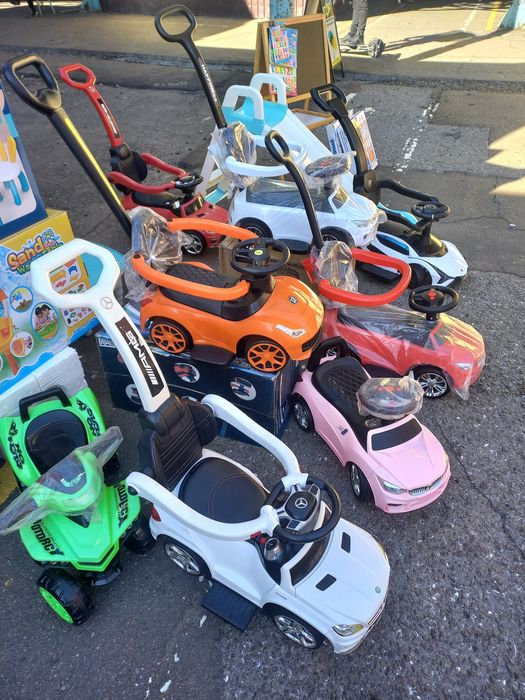 Толокар каталка гумові колеса,поворотна ручка,шкіра єко сидіння,муз.св