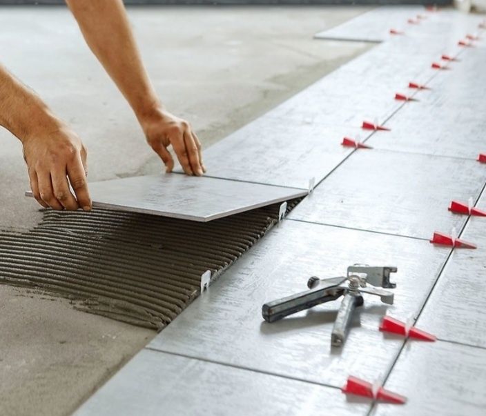 Плиточник Укладання плитки ,