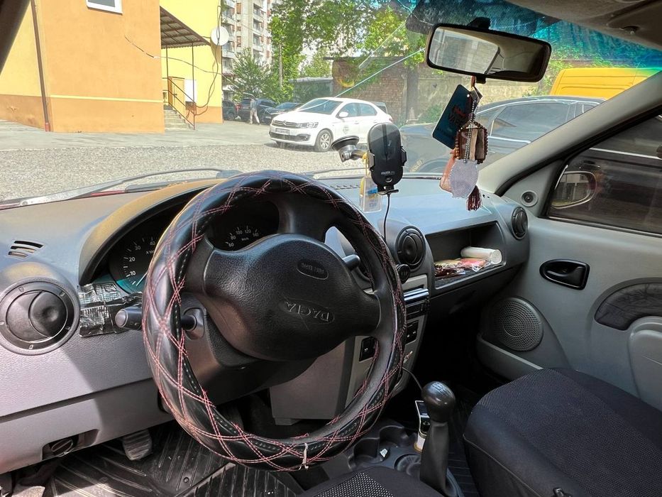 Лоґан1,4 газ бензин