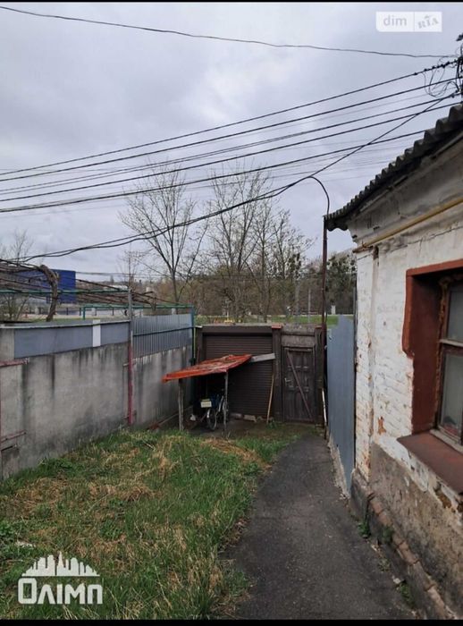 Продам пів будинку в топовом місці на вул.Кармелюка 0962