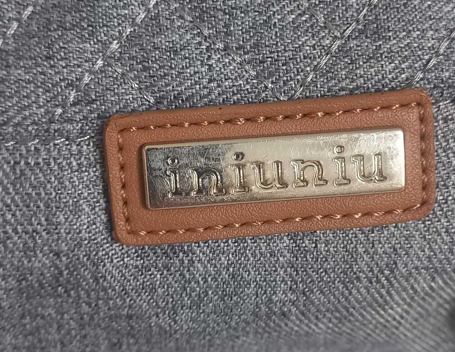 Mochila maternidade e porta documentos