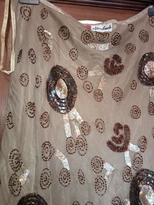 Saia bordada a lantejoulas em crepe de seda natural