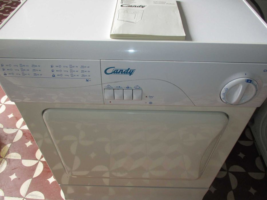 Máquina de Secar Roupa Candy vcom Manual de Instruções