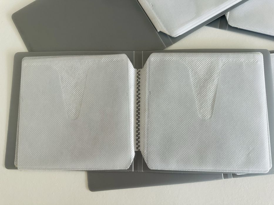 4 porta CDs / DVDs para armazenamento/ transporte de 32 unidades no total