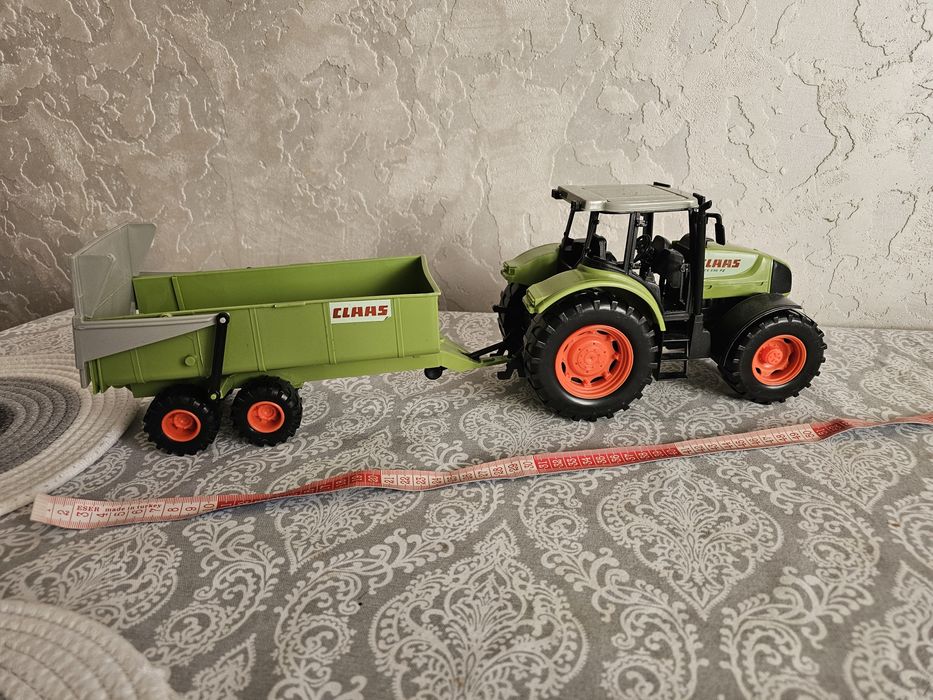 Продам іграшку трактор з причепом