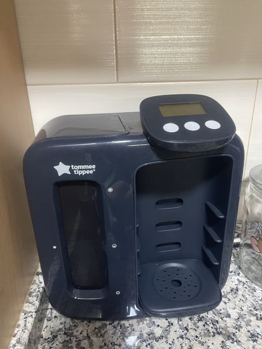 Maquina para preparar leite bebe