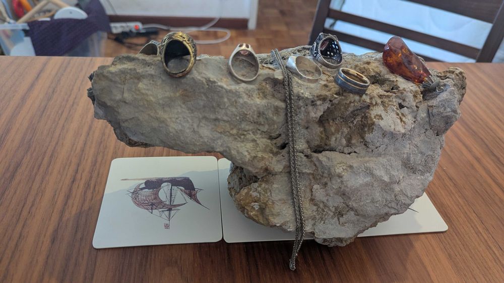 big beautiful rock (copper, silver, granite) to display jewelry or other items