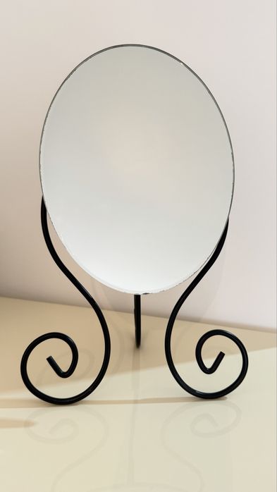 Espelho oval reclinavel