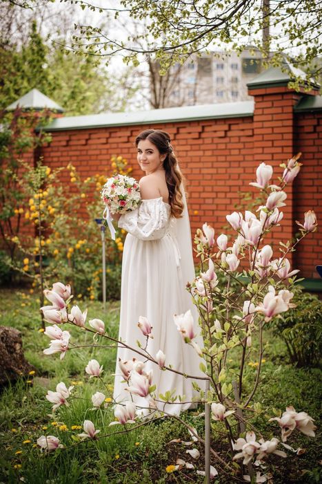 Весільна сукня з фатою