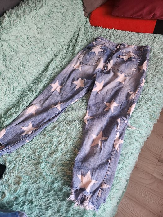Spodnie jeans gwiazdy z dziurami