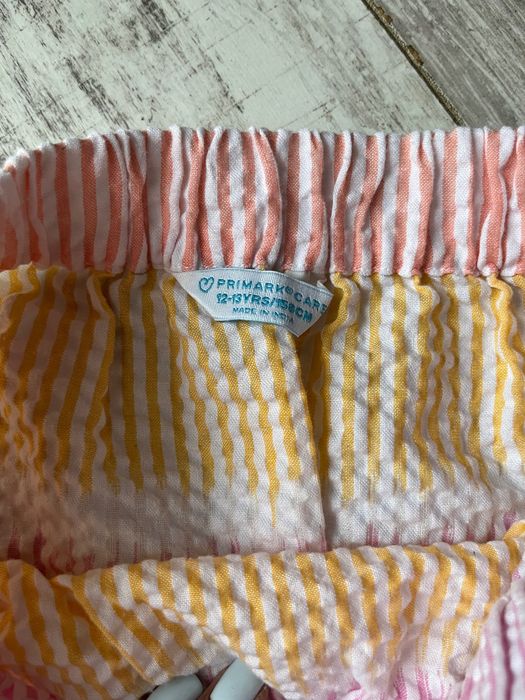 Жіноча куртка сорочка в клітинку