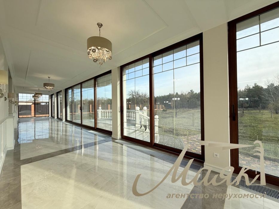 Продаж будинку площею 418,6 м² з виходом до води на ділянці 50 соток у КМ Dream Village, с. Лебедівка