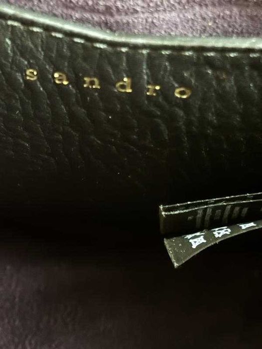 Sandro шкіряна сумка з люверсами Sandro Paris