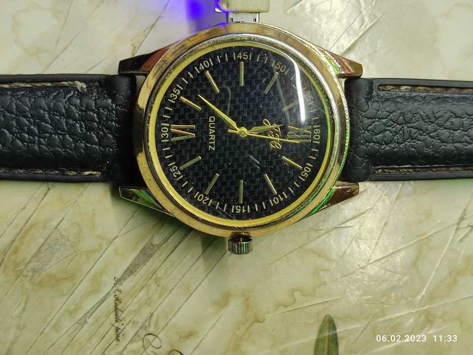 Часы с зажигалкой,зарядкой.