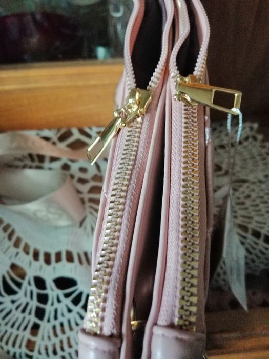 Listonoszka pudrowy roż